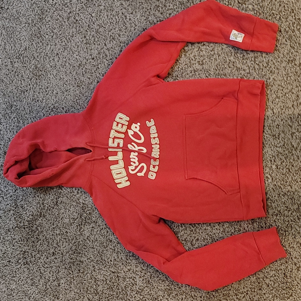 Hollister sweatshirt, very old, not has some tears shown in photo. Looks worn.